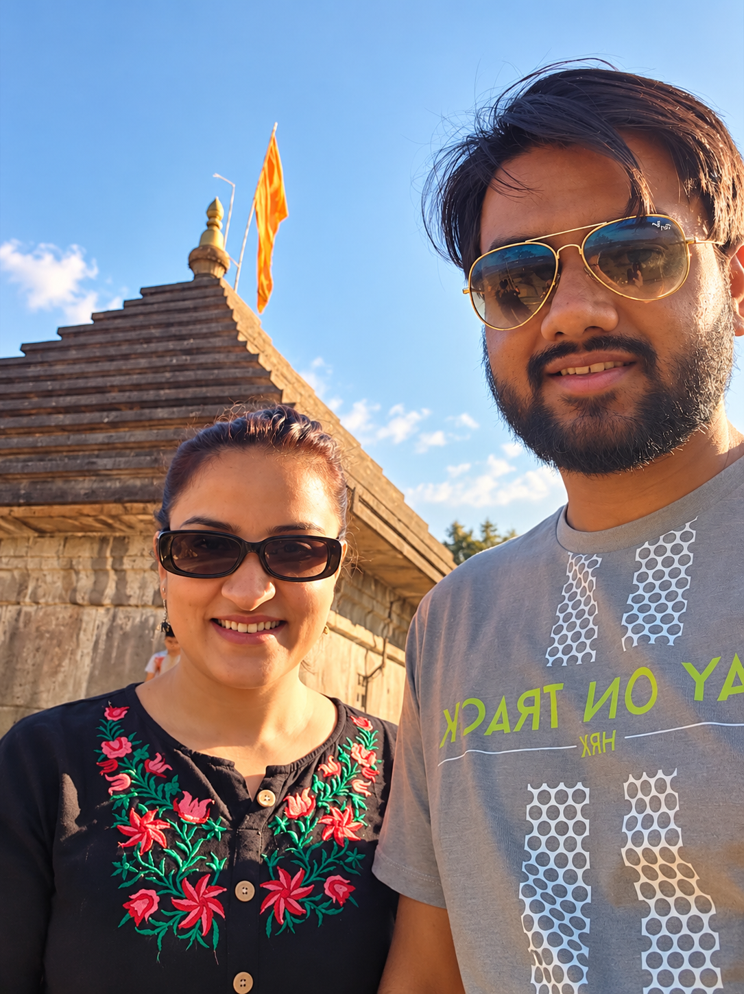 Divya and Tushar smiling